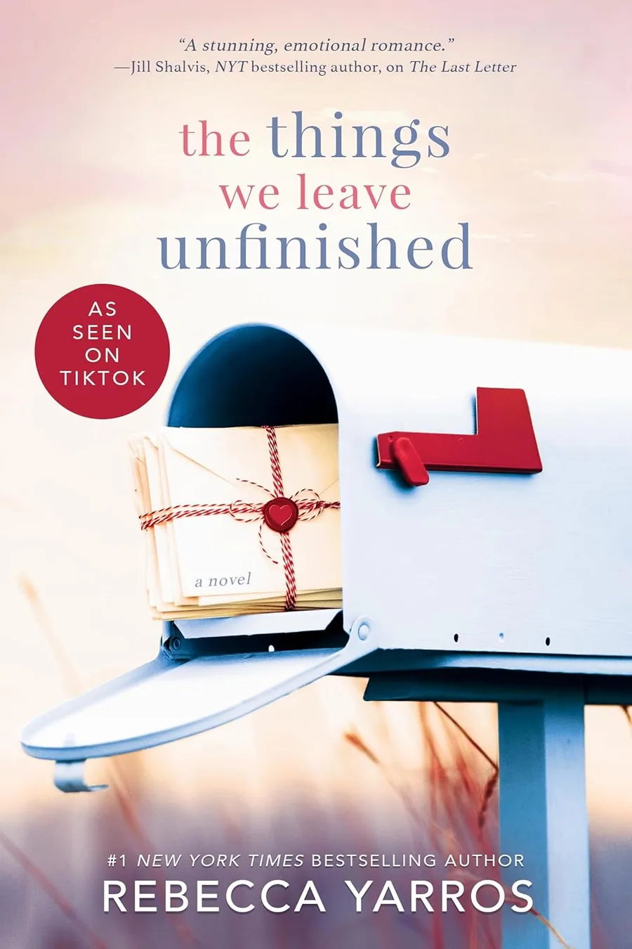 Book cover of The Things We Leave Unfinished by Rebecca Yarros